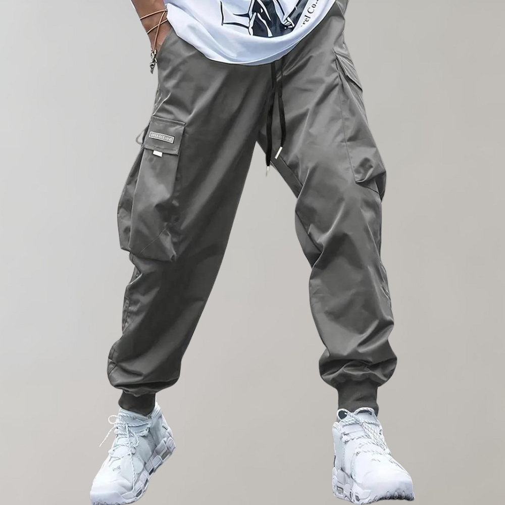 Winterfeld™ | Herren Cargo Jogginghose – Lila Streetwear-Hose mit Reißverschlusstaschen & Bündchen