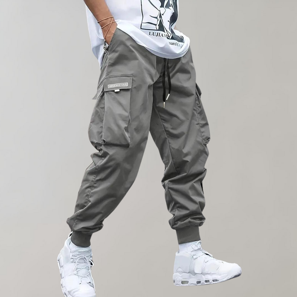 Winterfeld™ | Herren Cargo Jogginghose – Lila Streetwear-Hose mit Reißverschlusstaschen & Bündchen