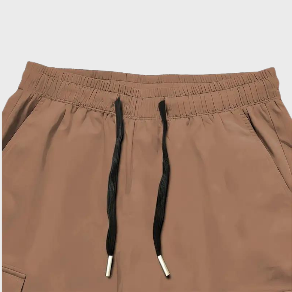 Winterfeld™ | Herren Cargo Jogginghose – Lila Streetwear-Hose mit Reißverschlusstaschen & Bündchen